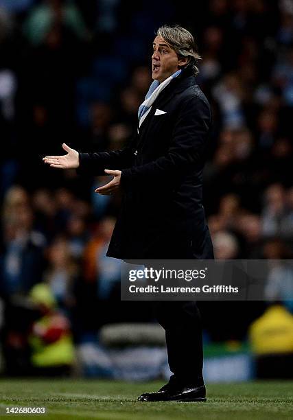 Manchester City Manager Roberto Mancini reacts during the Barclays Premier League match between Manchester City and West Bromwich Albion at the...