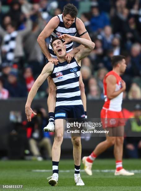 Jeremy Cameron of the Cats is congratulated by Isaac Smith of the Cats after kicking a goal during the 2022 AFL Grand Final match between the Geelong...