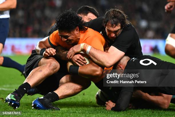 Pete Samu of the Wallabies is tackled during The Rugby Championship and Bledisloe Cup match between the New Zealand All Blacks and the Australia...