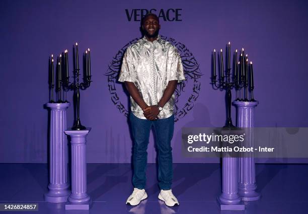 Romelu Lukaku of FC Internazionale is seen on the front row of the Versace Fashion Show during the Milan Fashion Week Womenswear Spring/Summer 2023...