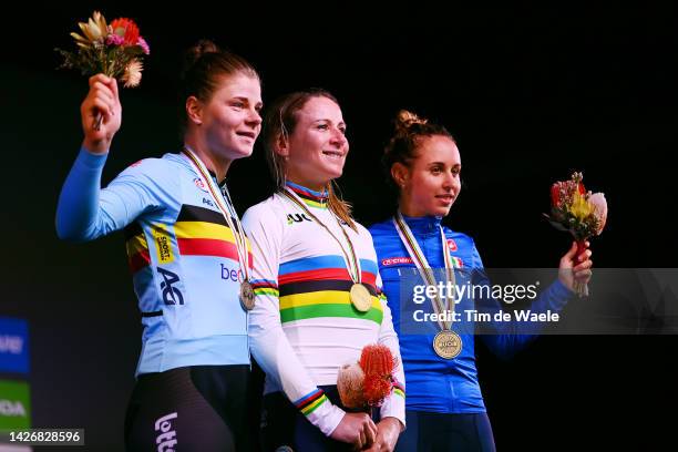 Silver medalists Lotte Kopecky of Belgium, gold medalists and world champion winner Annemiek Van Vleuten of Netherlands, and bronze medalists Silvia...