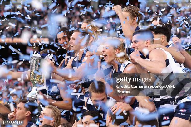 Joel Selwood of the Cats and team mates celebrate with the Premiership Cup after winning the 2022 AFL Grand Final match between the Geelong Cats and...