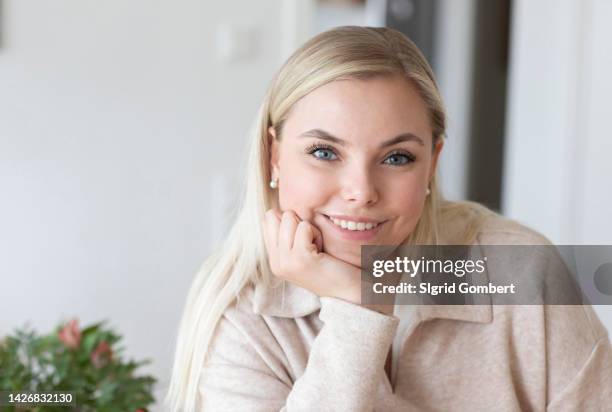 portrait of smiling blond woman - freiburg im breisgau stock pictures, royalty-free photos & images