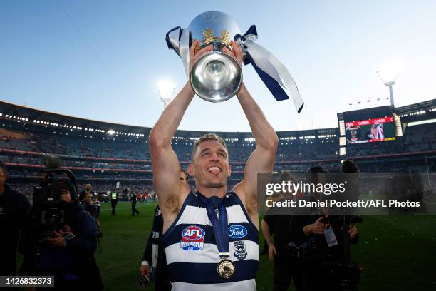 Joel Selwood of the Cats holds aloft the premiership cup after winning the 2022 AFL Grand Final match between the Geelong Cats and the Sydney Swans...