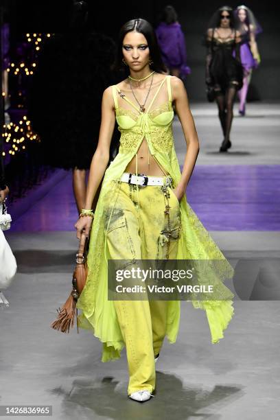 Model walks the runway during the Versace Ready to Wear Spring/Summer 2023 fashion show as part of the Milan Fashion Week on September 23, 2022 in...