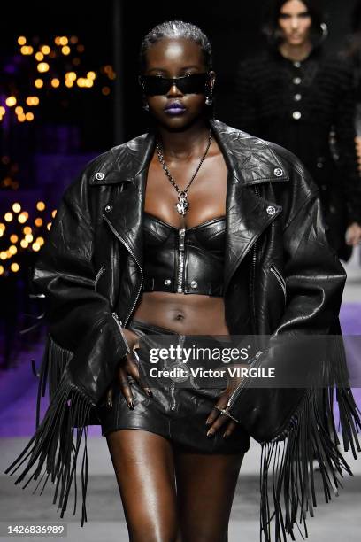 Adut Akech walks the runway during the Versace Ready to Wear Spring/Summer 2023 fashion show as part of the Milan Fashion Week on September 23, 2022...