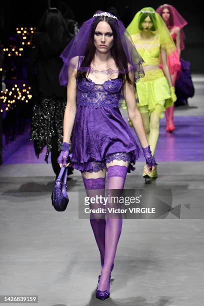 Model walks the runway during the Versace Ready to Wear Spring/Summer 2023 fashion show as part of the Milan Fashion Week on September 23, 2022 in...