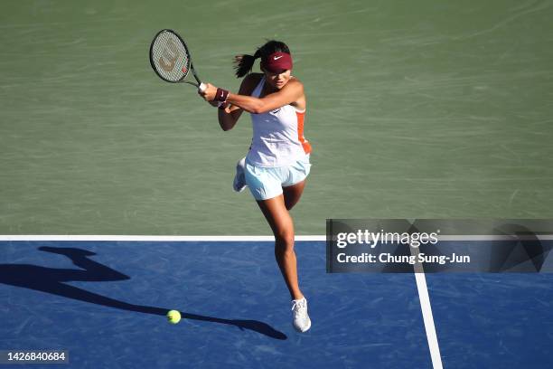 Emma Raducanu of Great Britain hits a shot against Jelena Ostapenko of Latvia during the women's semi final match of the Hana Bank Korea Open...