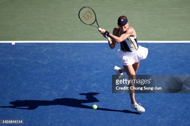 Ekaterina Alexandrova of Russia hits a shot against Tatjana Maria of Germany during the women's semi final match of the Hana Bank Korea Open...