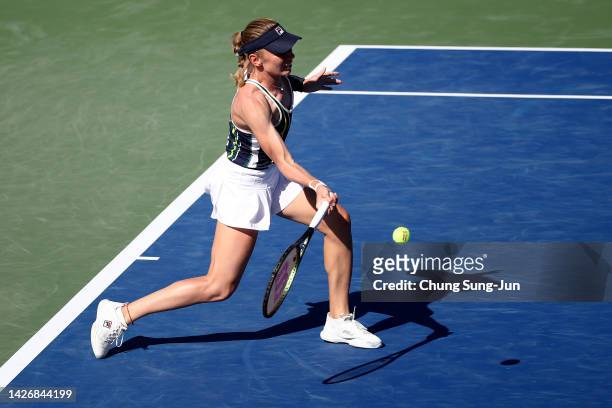 Ekaterina Alexandrova of Russia hits a shot against Tatjana Maria of Germany during the women's semi final match of the Hana Bank Korea Open...