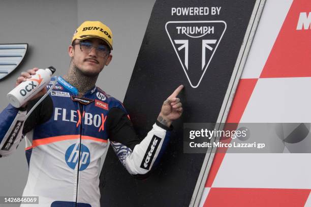 Aron Canet of Spain and Flexbox HP40 celebrates the Moto2 pole position at the end of the qualifying practice during the MotoGP of Japan - Qualifying...