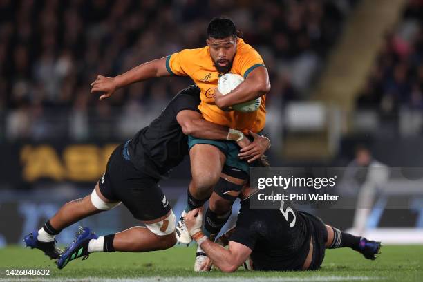 Folau Fainga'a of the Wallabies is tackled during The Rugby Championship and Bledisloe Cup match between the New Zealand All Blacks and the Australia...