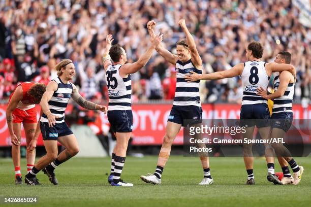 Rhys Stanley of the Cats and Patrick Dangerfield of the Cats celebrate winning the 2022 AFL Grand Final match between the Geelong Cats and the Sydney...
