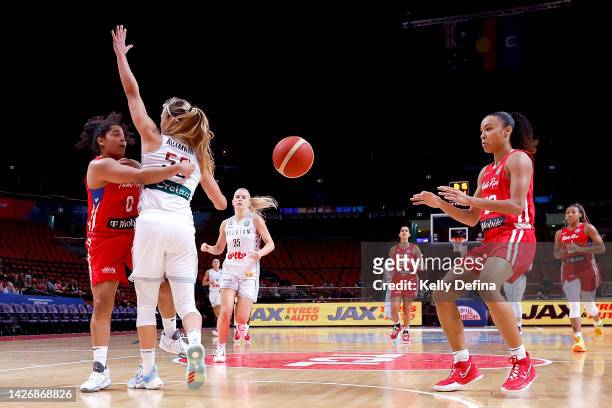 Jennifer O'Neill of Puerto Rico passes to Trinity San Antonio of Puerto Rico during the 2022 FIBA Women's Basketball World Cup Group A match between...