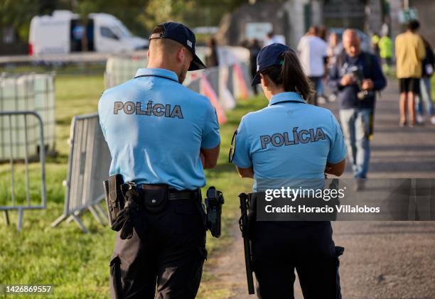 Portuguese police officers patrol the premises on the first day of the 25th edition of the Hot Air Ballon Festival in Quinta de Cima of Marquês de...