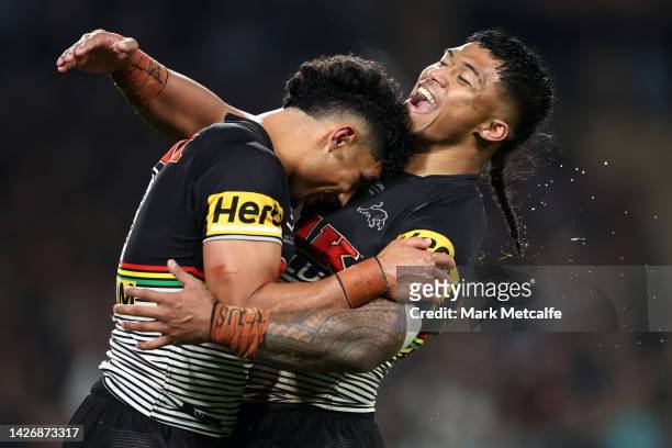 Izack Tago of the Panthers celebrates with team mate Brian To'o after scoring a try during the NRL Preliminary Final match between the Penrith...