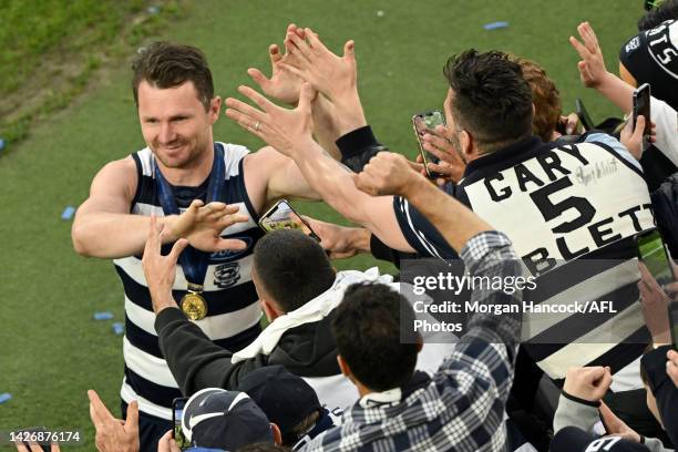 Patrick Dangerfield of the Cats greets fans following the 2022 AFL Grand Final match between the Geelong Cats and the Sydney Swans at the Melbourne...