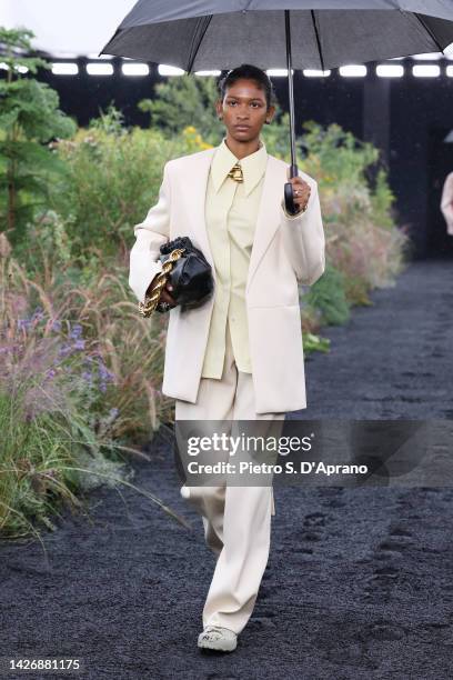 Model walks the runway of the Jil Sander Fashion Show during the Milan Fashion Week Womenswear Spring/Summer 2023 on September 24, 2022 in Milan,...