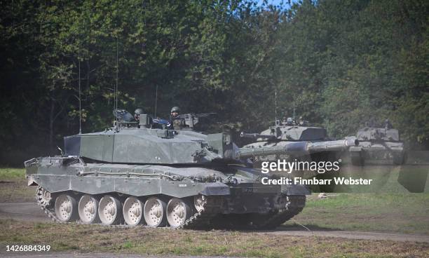 Challenger 2 main battle tanks are displayed for the families watching The Royal Tank Regiment Regimental Parade, on September 24, 2022 in Bulford,...