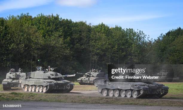 Challenger 2 main battle tanks are displayed for the families watching The Royal Tank Regiment Regimental Parade, on September 24, 2022 in Bulford,...