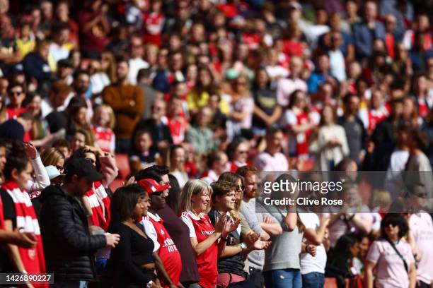 Fans enjoy the atmosphere during the FA Women's Super League match between Arsenal and Tottenham Hotspur at Emirates Stadium on September 24, 2022 in...