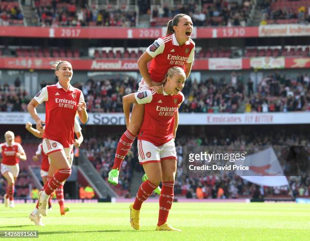 Beth Mead celebrates scoring a goal for Arsenal with Katie McCabe during the FA Women's Super League match between Arsenal and Tottenham Hotspur at...