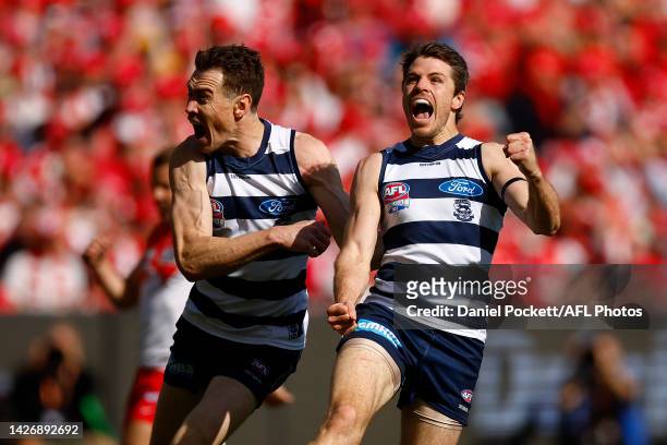 Isaac Smith of the Cats celebrates with Jeremy Cameron of the Cats after kicking a goal during the 2022 AFL Grand Final match between the Geelong...