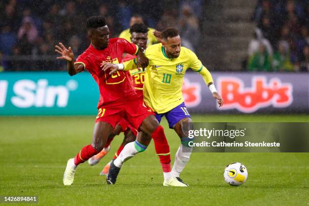 Iddrisu Baba of Ghana challenges Neymar Jr of Brazil during the international friendly match between Brazil and Ghana at Stade Oceane on September...