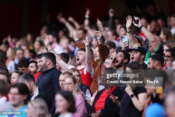 Fans of Arsenal show their support during the FA Women's Super League match between Arsenal and Tottenham Hotspur at Emirates Stadium on September...