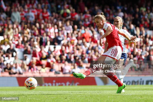 Vivianne Miedema of Arsenal scores their team's second goal during the FA Women's Super League match between Arsenal and Tottenham Hotspur at...