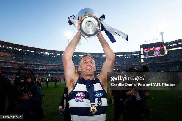 Joel Selwood of the Cats holds aloft the premiership cup after winning the 2022 AFL Grand Final match between the Geelong Cats and the Sydney Swans...