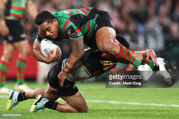 Tevita Tatola of the Rabbitohs is tackled during the NRL Preliminary Final match between the Penrith Panthers and the South Sydney Rabbitohs at Accor...