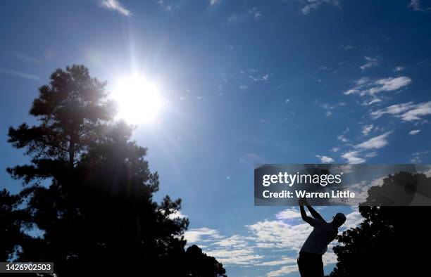 Cam Davis of Australia and the International Team plays his shot from the eighth tee during Saturday morning foursomes on day three of the 2022...