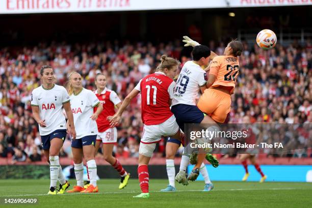 Vivianne Miedema of Arsenal scores their team's fourth goal during the FA Women's Super League match between Arsenal and Tottenham Hotspur at...