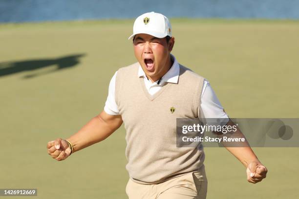 Tom Kim of South Korea and the International Team reacts after winning the 11th hole during Saturday morning foursomes on day three of the 2022...