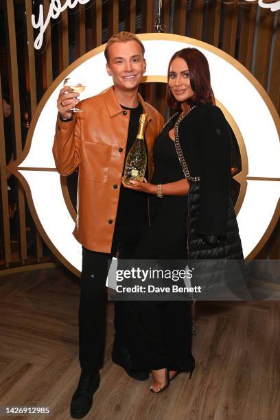 Harry Derbidge and Amy Childs attend the launch of Oche, The Strand's ultimate West End themed bottomless brunch on September 24, 2022 in London,...