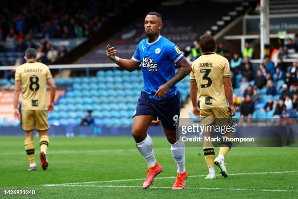 Jonson Clarke-Harris of Peterborough United celebrates scoring their side's second goal during the Sky Bet League One between Peterborough United and...