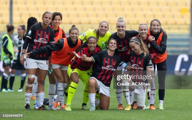 Players of AC Milan celebrate after winning during the Women's Serie A match between Parma and AC Milan at Stadio Tardini on September 24, 2022 in...