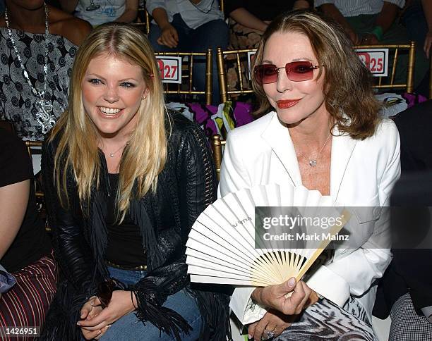 Actress Joan Collins sits next to Natalie Maines of the Dixie Chicks during the House of Field Spring/Summer 2003 Collection at the New York Public...