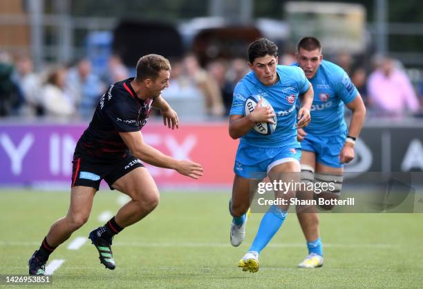 Louis Rees-Zammitt of Gloucester Rugby is tackled by Alex Lewington of Saracens during the Gallagher Premiership Rugby match between Saracens and...