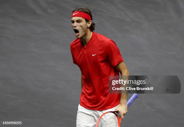 Taylor Fritz of Team World celebrates victory in the singles match between Cameron Norrie of Team Europe and Taylor Fritz of Team World during Day...