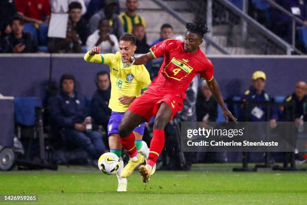 Mohamed Salisu of Ghana controls the ball against Antony of Brazil during the international friendly match between Brazil and Ghana at Stade Oceane...