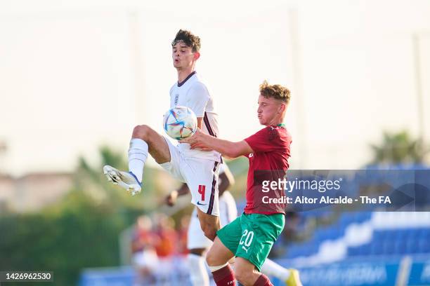 Charlie Patino of England competes for the ball with Elias Kurt of Morocco during an international friendly game between England U20 and Morocco U20...