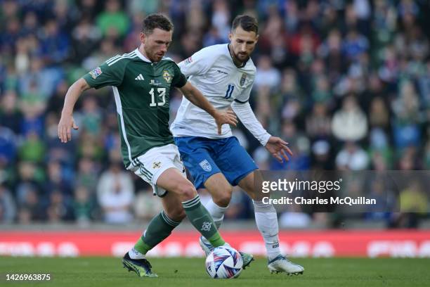 Corry Evans of Northern Ireland is marked by Elbasan Rashani of Kosovo during the UEFA Nations League League C Group 2 match between Northern Ireland...