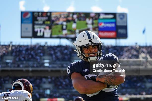 Tight end Brenton Strange of the Penn State Nittany Lions celebrates after scoring a touchdown against the Central Michigan Chippewas during the...