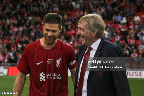 Kenny Daglish with Xabi Alonso at Anfield on September 24, 2022 in Liverpool, England.