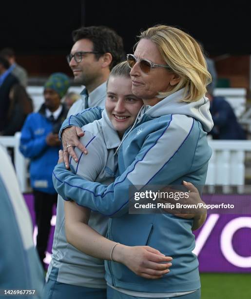 Charlie Dean and Lisa Keightley of England embrace after India won the 3rd Royal London One Day International between England and India at Lord's...