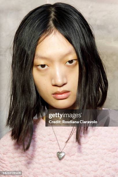 Model Yilian Hua poses backstage at the Sportmax Fashion Show during the Milan Fashion Week Womenswear Spring/Summer 2023 on September 23, 2022 in...