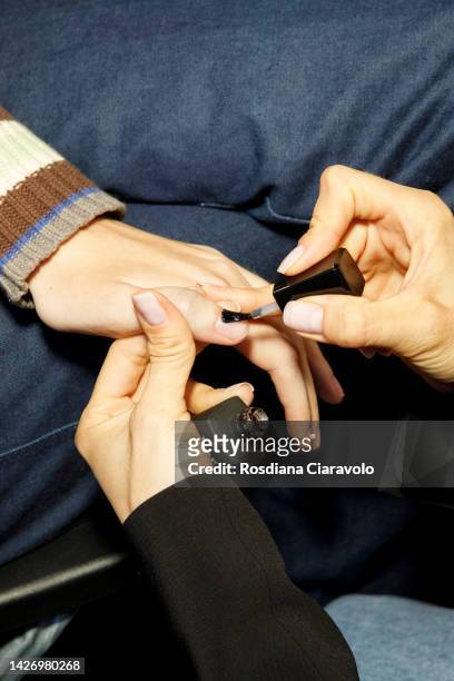 Model, nails detail, is see during the make up backstage at the Sportmax Fashion Show during the Milan Fashion Week Womenswear Spring/Summer 2023 on...