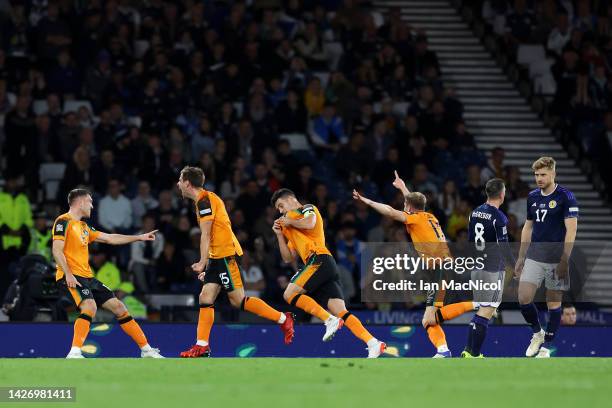 John Egan of Republic of Ireland celebrates scoring their side's first goal with teammates during the UEFA Nations League League B Group 1 match...